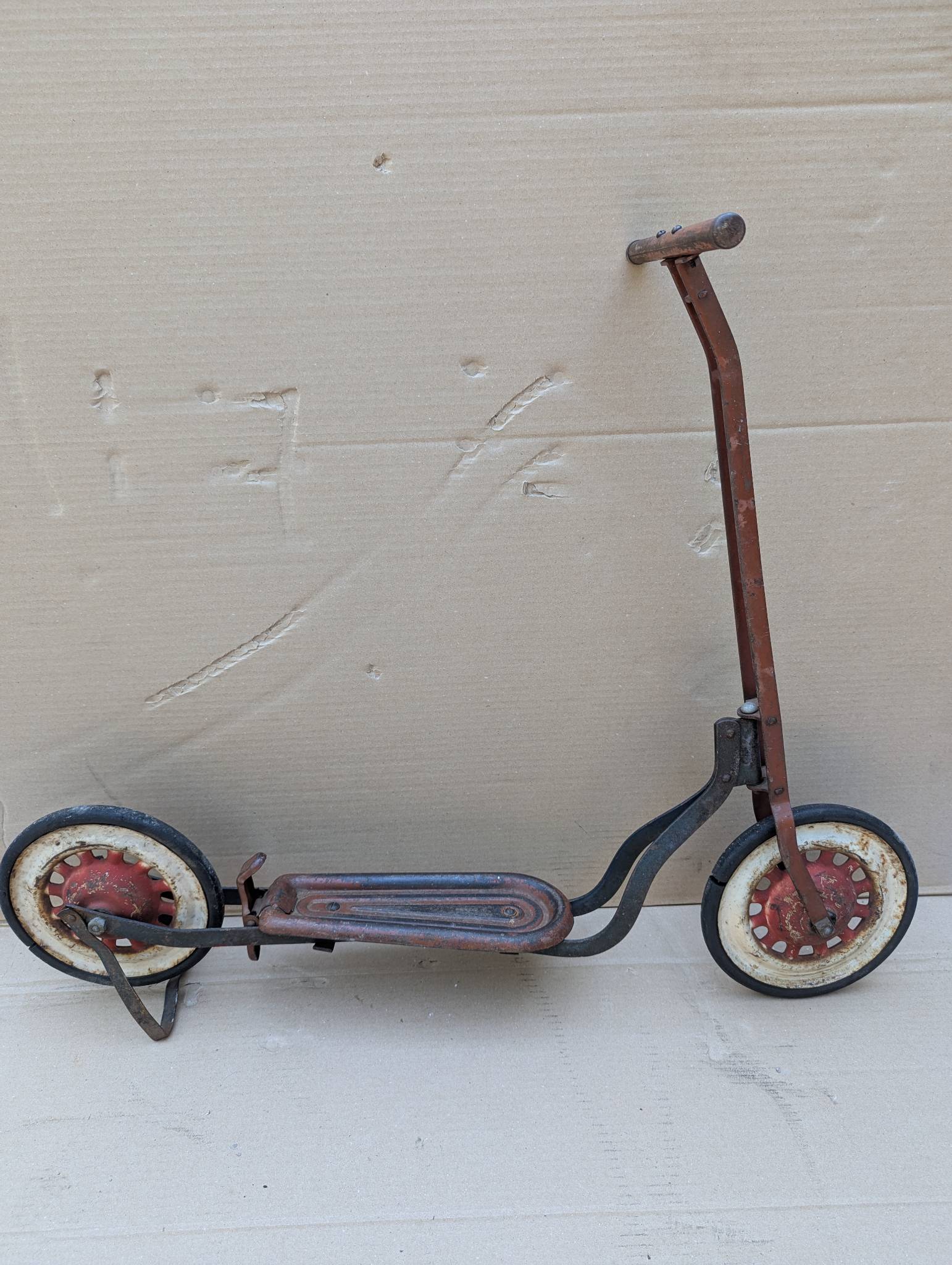 1930s Metal Kick Scooter with Red and White Wheels