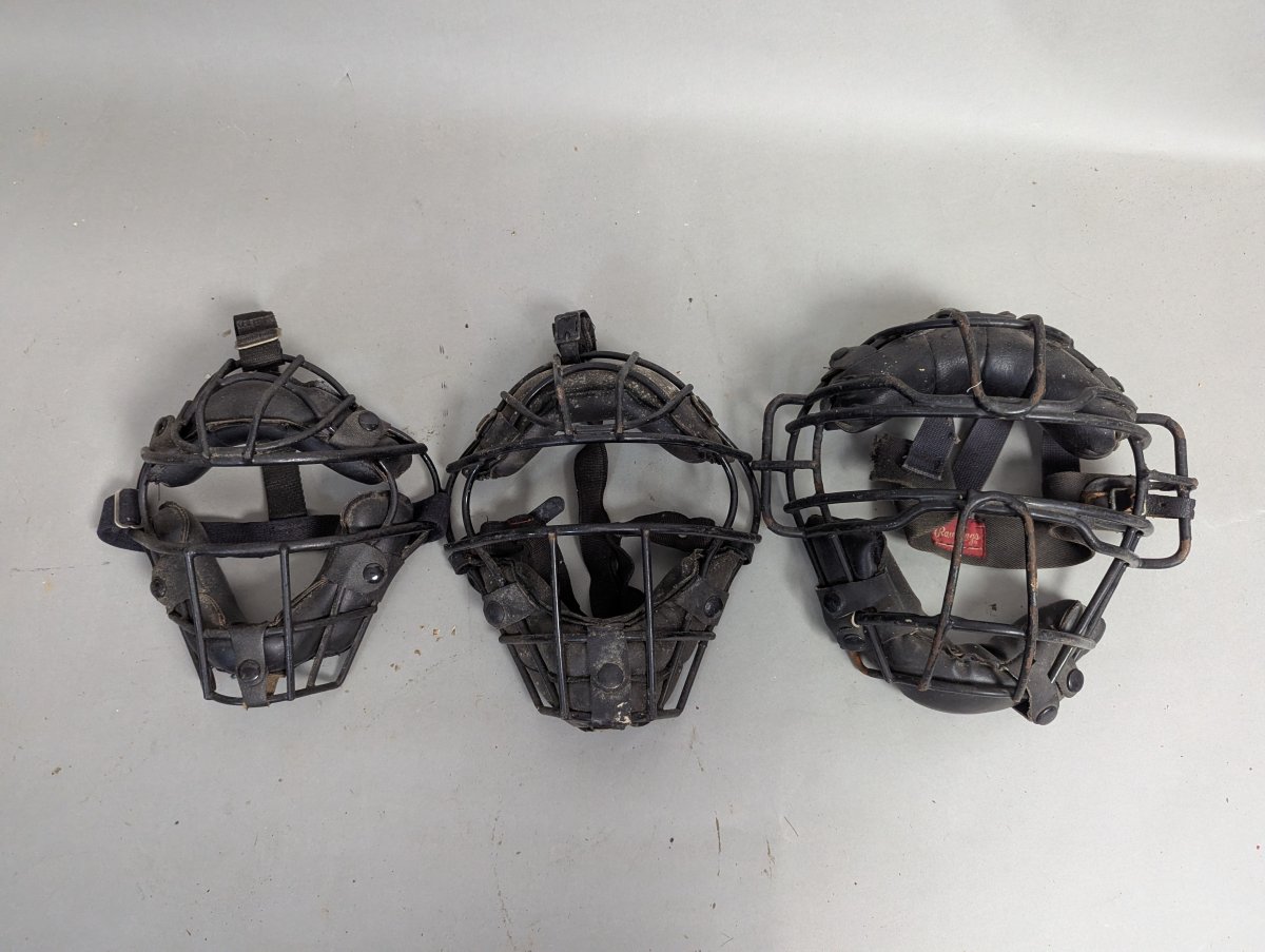 Vintage Set of Baseball Catcher's Masks with Rawlings Brand and Wear