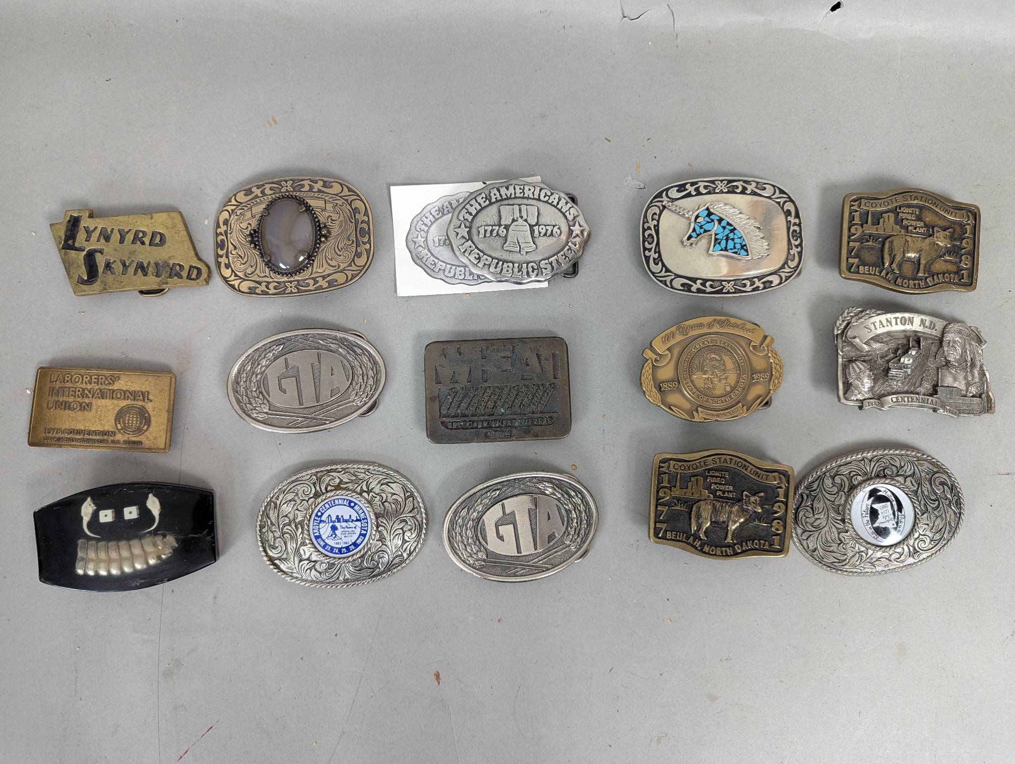 Fifteen Assorted Belt Buckles Various Designs and Materials
