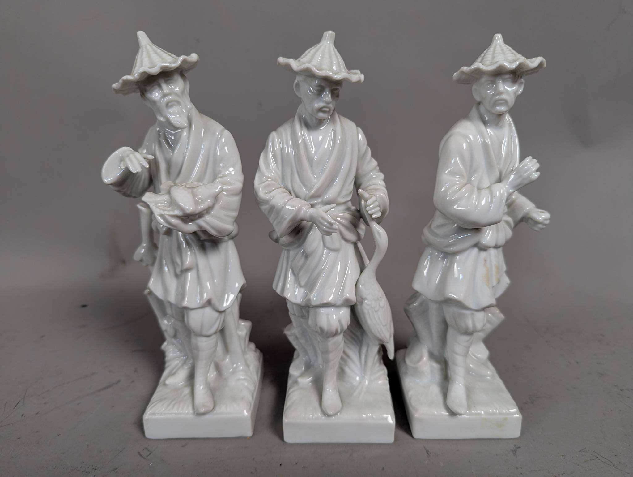 Fitz and Floyd Blanc de Chine Porcelain Figurines of Chinese Men with Crane