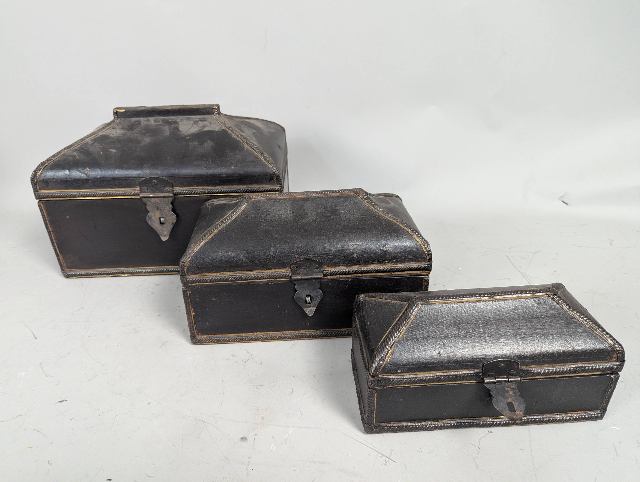 Three Wooden Nesting Boxes with Metal Closures