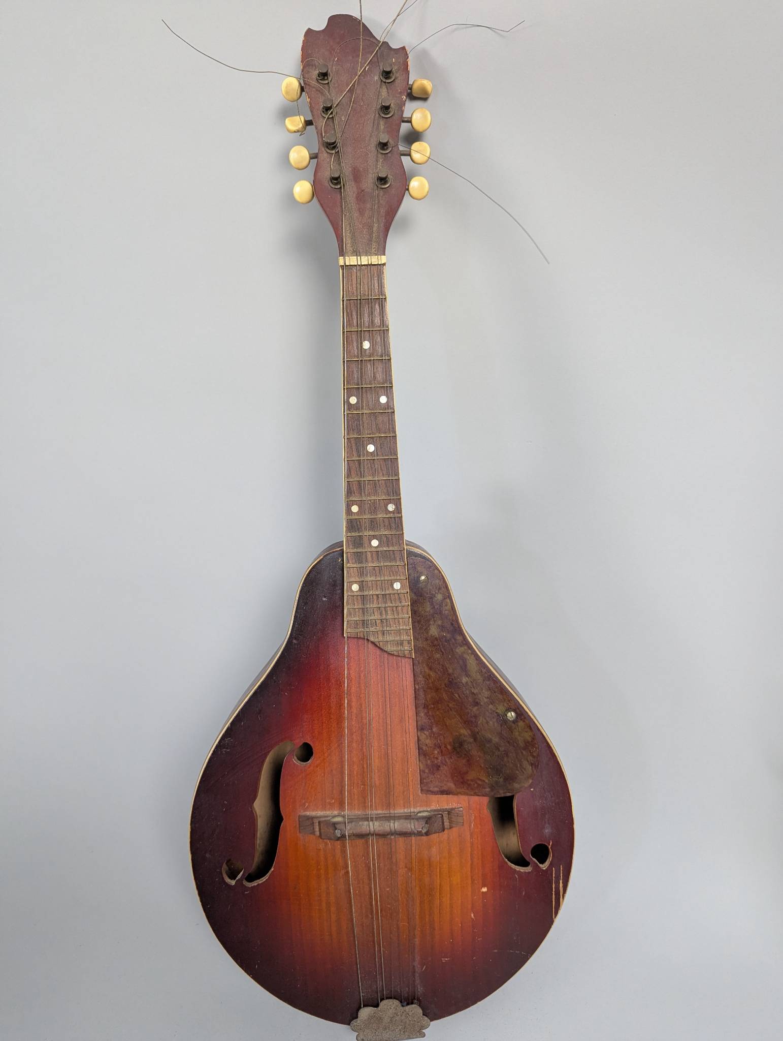 Vintage Eight String Mandolin with Wooden Body and Metal Accents