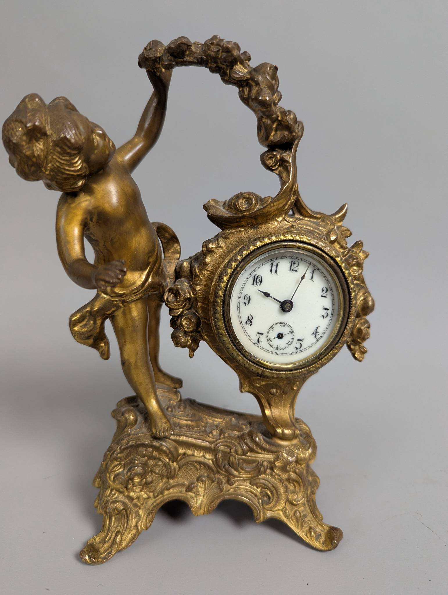 Vintage New Haven Cherub Clock with Ornate Design