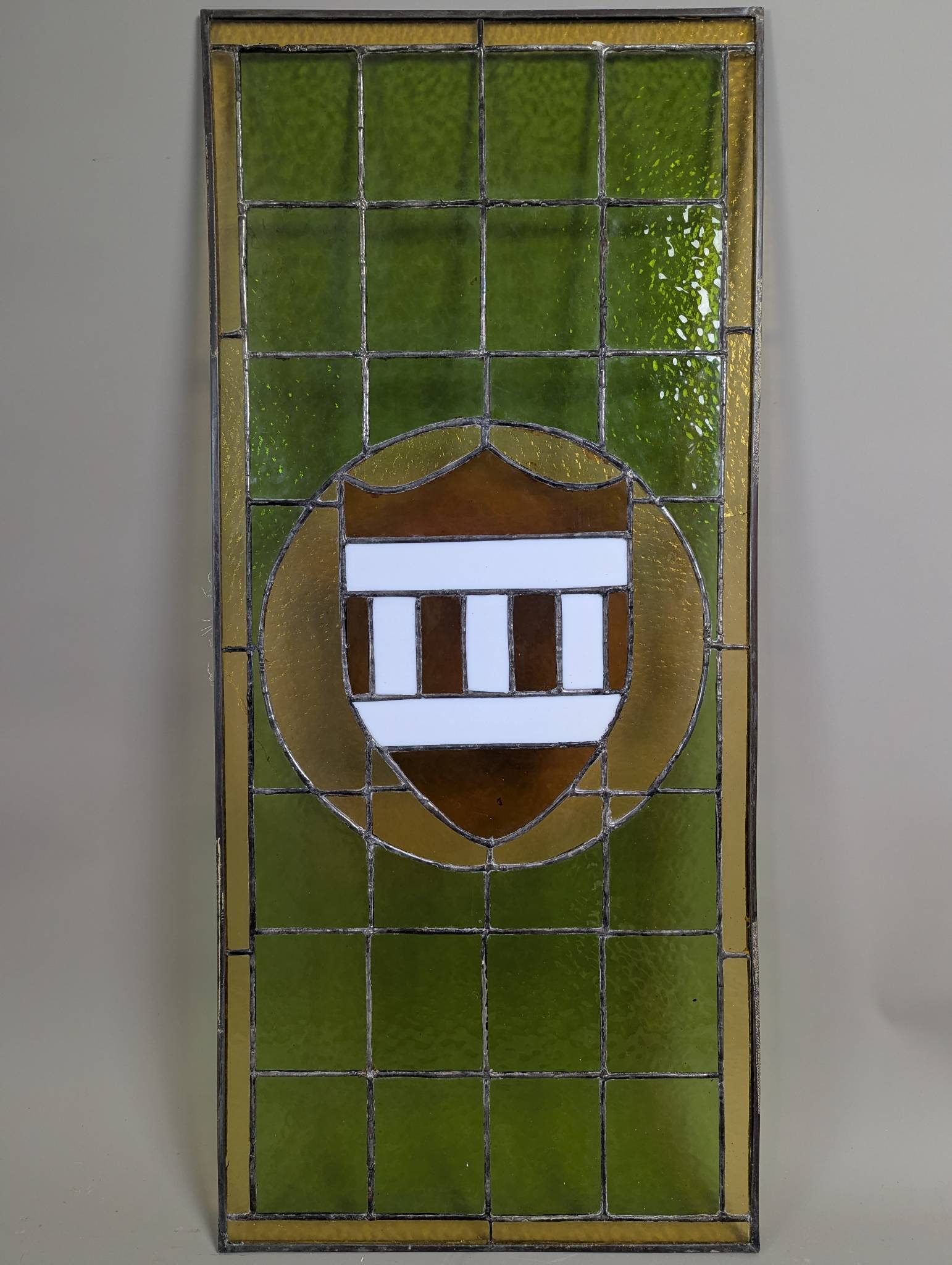Leaded Stained Glass Window with Geometric Shield Design