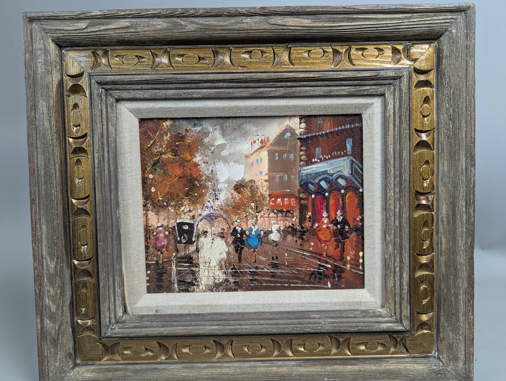 Framed Painting of a Parisian Street Scene with Figures and Cafe