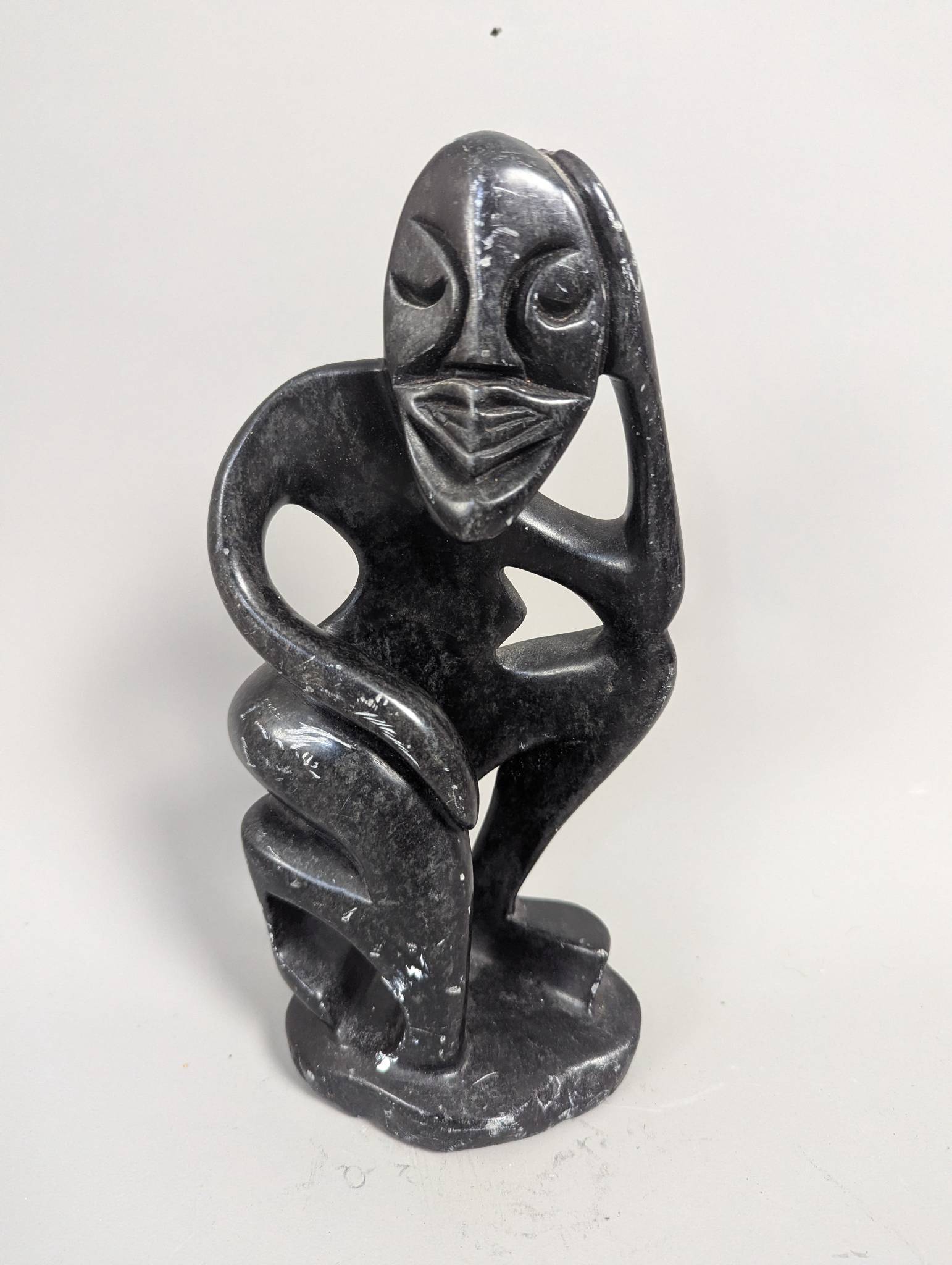 Abstract Shona Stone Sculpture Depicting Contemplative Figure