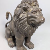 Antique Bronze Lion Sculpture With Patinated Finish